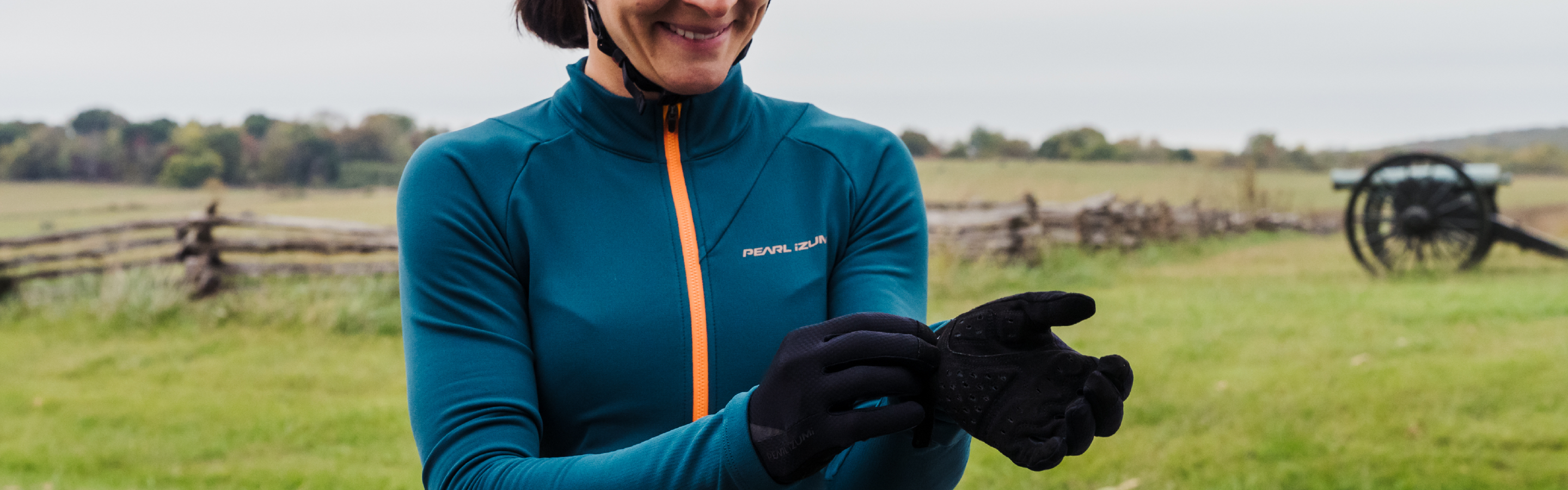 Cyclist Putting on Riding Gloves