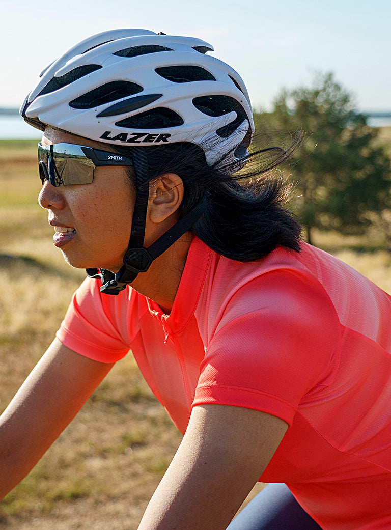 Cyclist on a Ride Wearing Bright Red PEARL iZUMi Jersey
