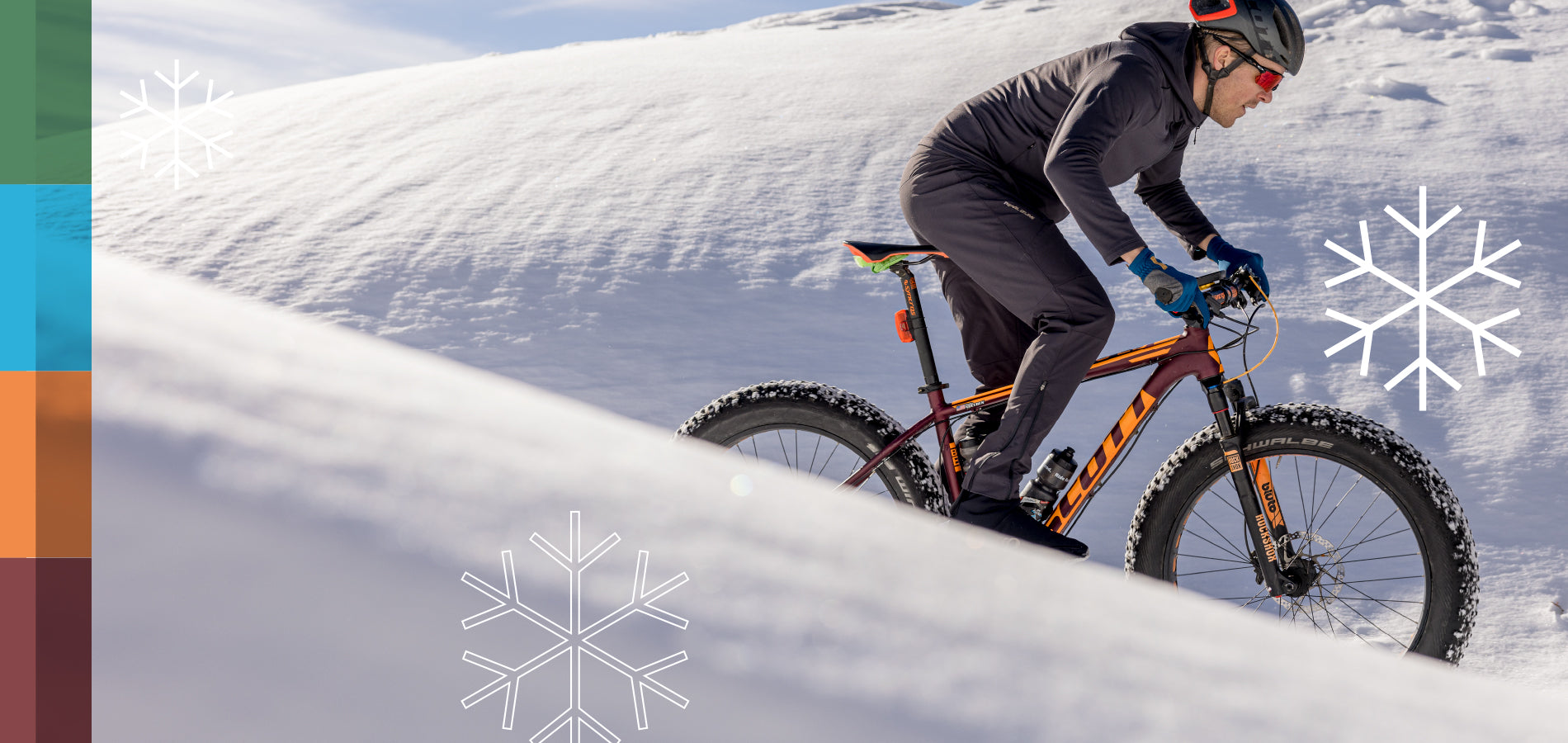 Fat Tire Bike Rider Pedaling Through The Snow