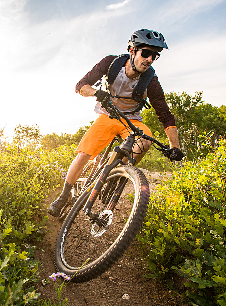 Mountain Biker Taking a Corner on a Trail