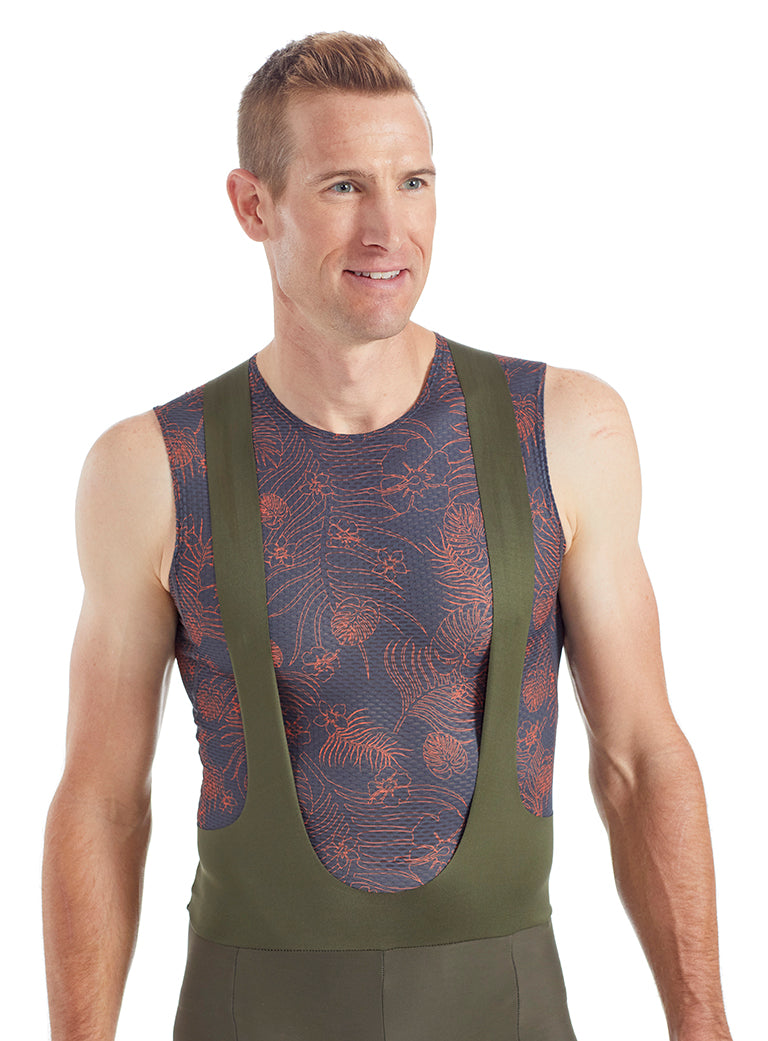 Rider Wearing a Sleeveless Baselayer Under Bib Shorts