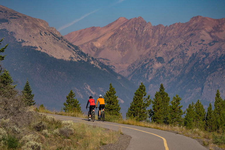 Road Cyclists Riding on a Bike Path in The Mountains