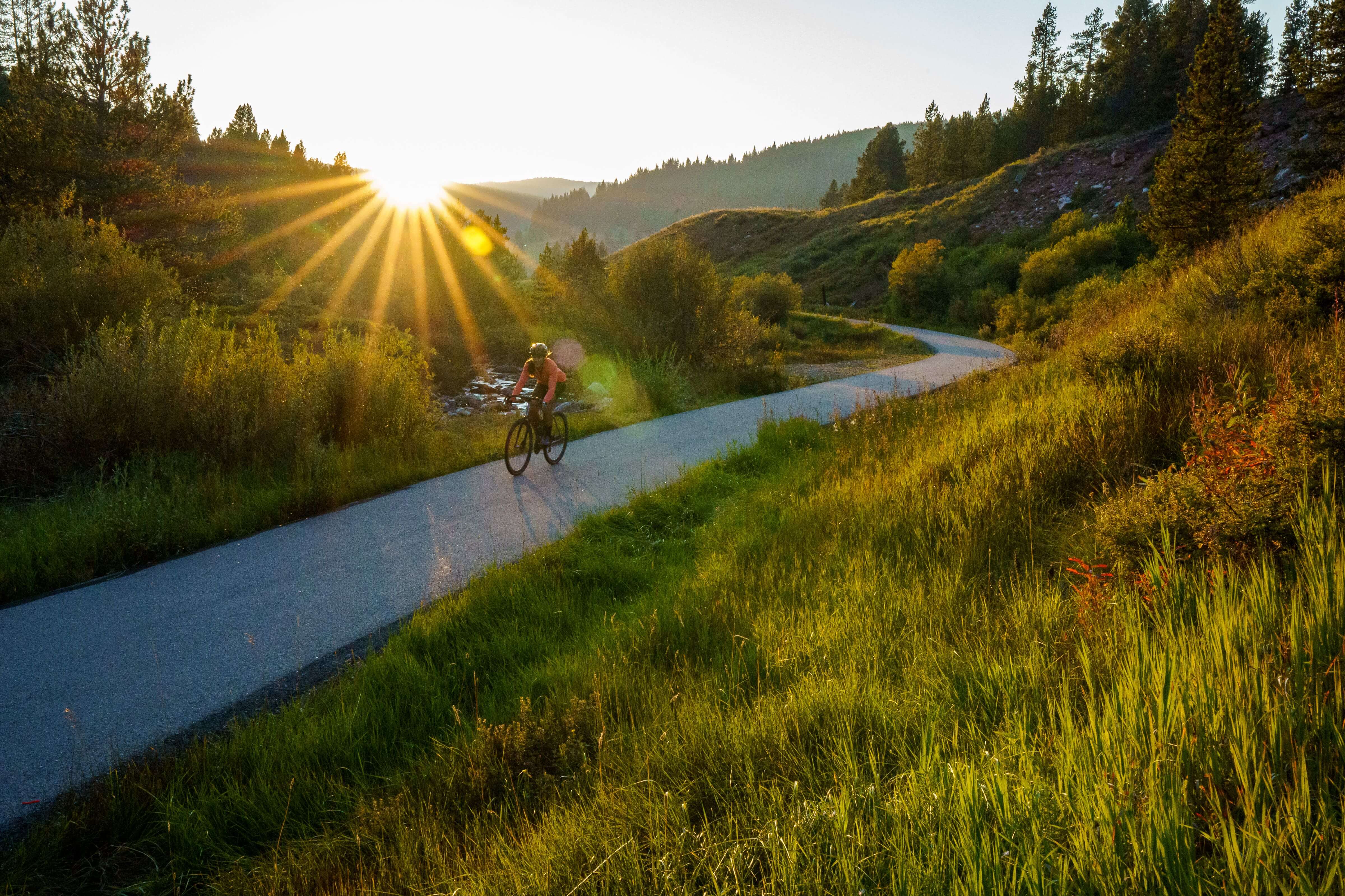 Cyclist Riding on Bike Path