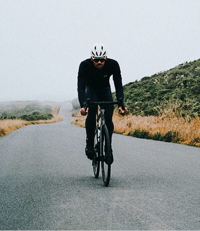 Road cyclist wearing PEARL iZUMi apparel