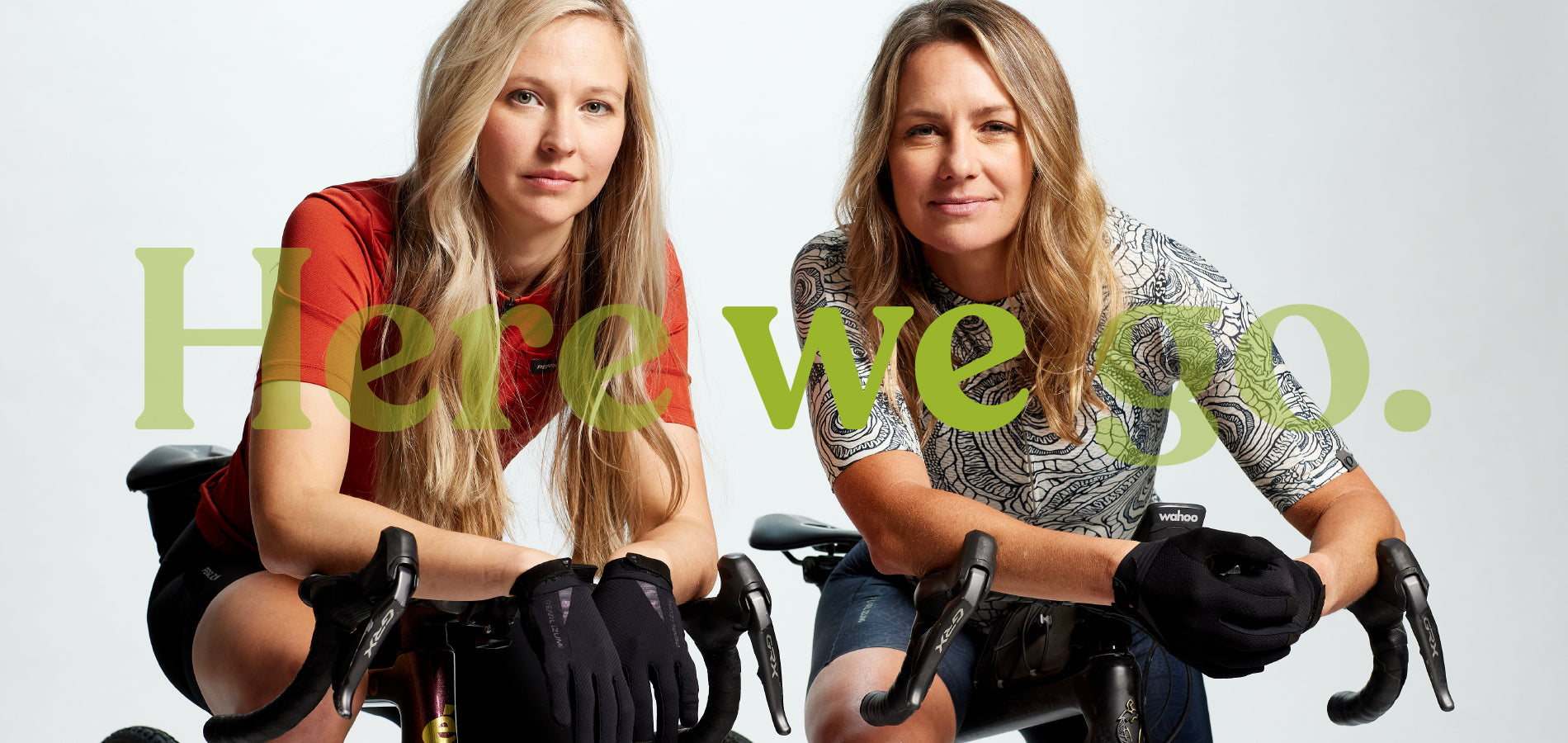 Cyclists Sitting on Road Bikes Posing for Camera