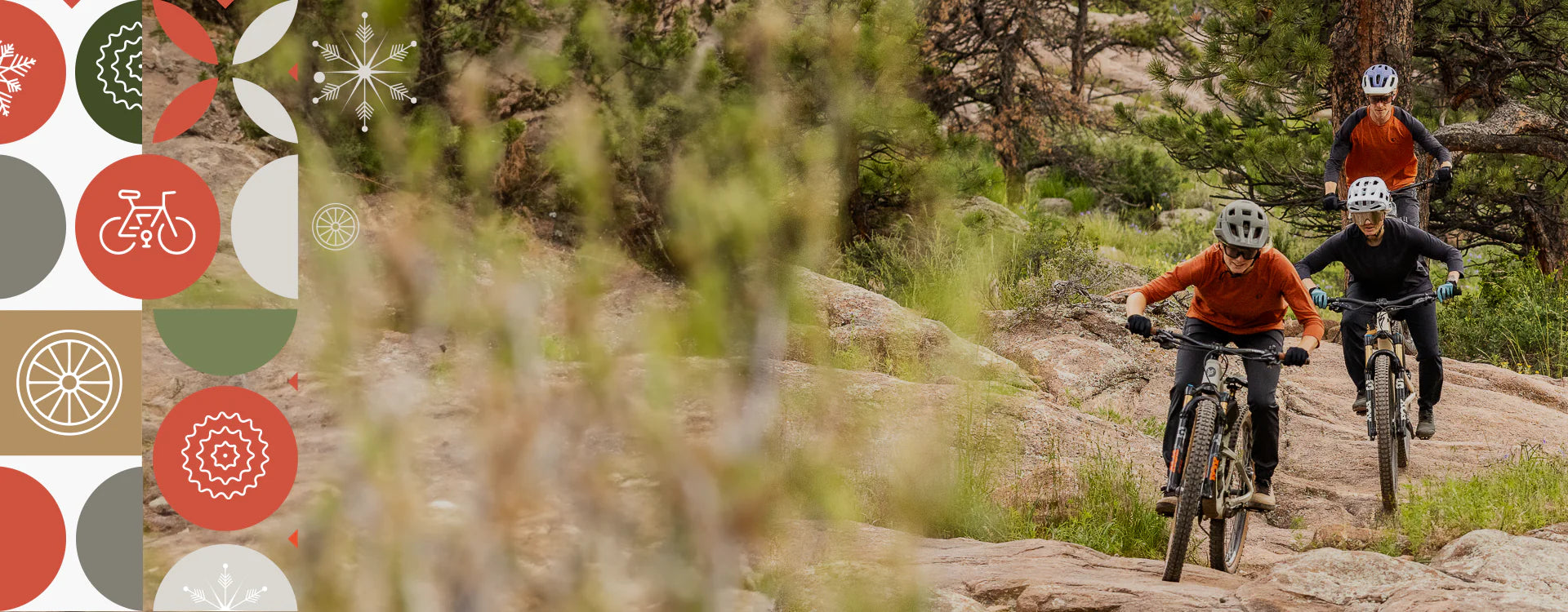 Woman and man riding on a trail wearing PEARL iZUMi apparel