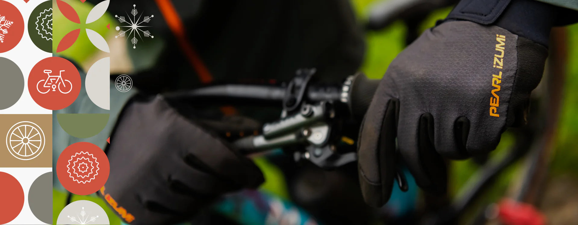 Male cyclist preparing to go ride in the cold while wearing PEARL iZUMi Lobster Gloves