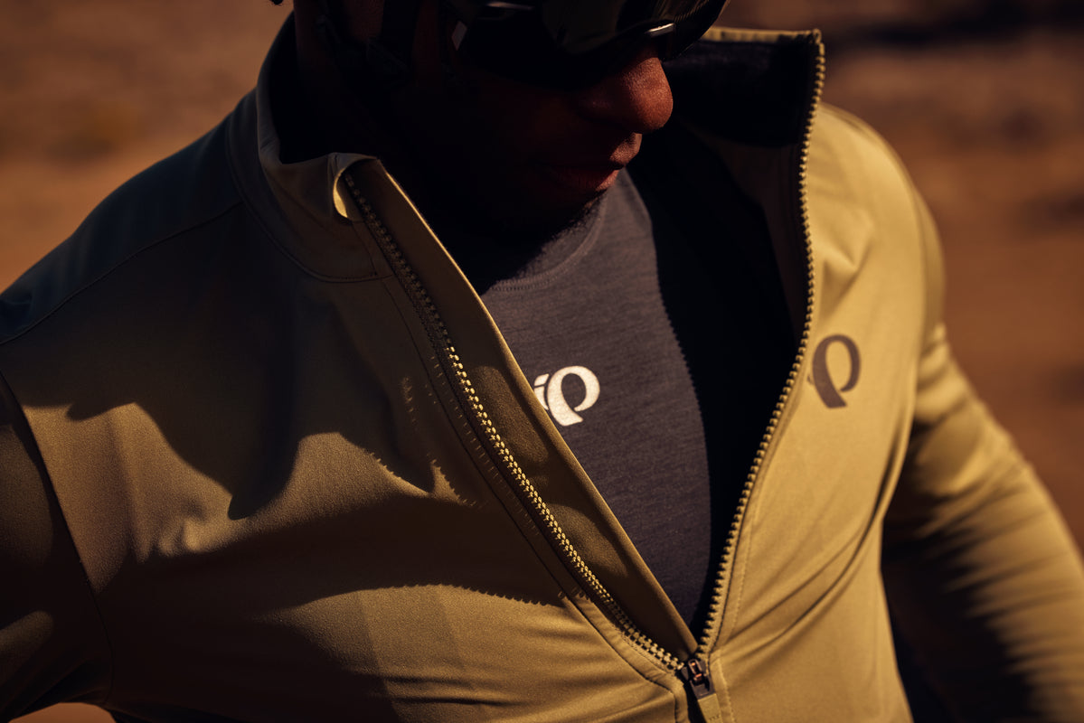 Close up image of male cyclist wearing a base layer under his long sleeve cycling jersey
