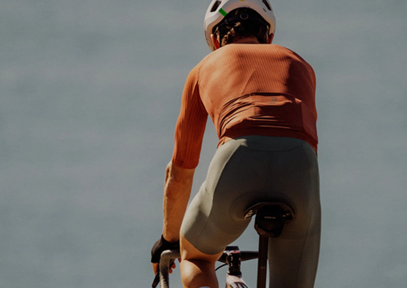 Person riding a bicycle with a blurred background